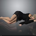 Woman Lying On Smooth Surface Wearing Black Outfit With Short Hair