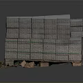 Stacked Gray Bricks Equipment Secured With Green Straps On Wooden Pallets And Broken Cardboard