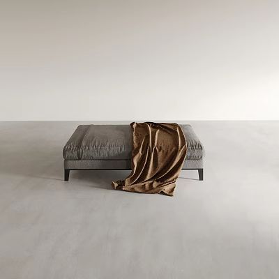 Soft Gray Upholstered Ottoman With Cozy Brown Blanket In Minimalist Room 3d model