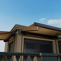 Brown Awnings Installed On Building Exterior Balcony With Railing And Windows Under Blue Sky