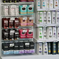 Retail Display Shelves With Multiple Tiers And Neatly Arranged Daily Necessities Products