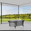 Modern White Bathtub With Black Metal Stand In Glass Wall Bathroom Overlooking Green Landscape
