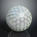 Shiny Hexagonal Pattern Sphere Featuring Geometric Design And Reflective Surface On Dark Background