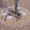 Outdoor Chairs On Circular Wooden Platform With Tree And Gravel Ground