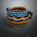 Sculpted Pottery Jar With Artistic Blue Yellow Decorative Patterns And Handles