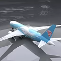 China Southern Airlines Blue And White Passenger Aircraft With Phoenix Design Exterior