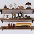 Decorative Ornament Set On Wooden Shelves With Oriental Designs And Mixed Materials