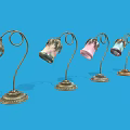 Artistic Table Lamps With Curved Metal Stems And Colorful Glass Shades
