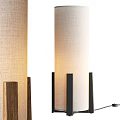 Modern Floor Lamps With Wooden And Black Bases And Linen Shades Emitting Soft Light