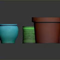 Colorful Containers Arrangement Featuring Green Striped Can Red Buckets And Blue Ceramic Pot