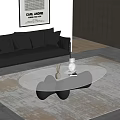 Modern Black Glass Coffee Table With Decorative Items In Contemporary Living Room