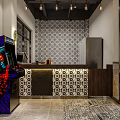 Modern Restaurant Interior With Pendant Lights Tables Chairs Green Plants Bicycle Decor And Tiled Floor