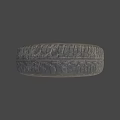 Worn Car Tire With Deep Tread And Rusty Metal Rim On Gray Background