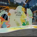 Spring Photo Check-in Spot With Cartoon Girl Arch Design Flower Decorations And Modern Buildings