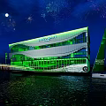 Seoul Wave Building Night Scene With Green Exterior Fireworks And Red Walkway