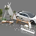 Outdoor Stylish Setup With White Car Triangular Tent Floral Decor And Green Plants