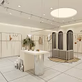 Elegant Modern Clothing Store With Window Display Mannequins Green Plants And Interior Lighting