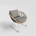 Modern Leisure Chair With Woven Rattan Frame Gray Cushion And Metal Legs