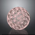 Decorative Pink Hollow Sphere Featuring Intricate Geometric Patterns And Reflective Surface