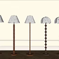Elegant Floor Lamps With Light Shades Against Decorative Wall And Wooden Floor