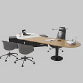 Modern Curved Office Desk with Desk Lamp Laptop Documents and Ergonomic Gray Office Chairs