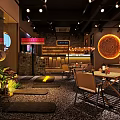 Cozy Modern Bar Interior With Warm Lighting Wooden Tables Green Plants And Circular Decor