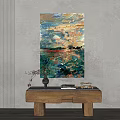 Abstract Painting On Wall Above Wooden Table With Vase Books And Decor