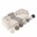 Modern Plush Beige Sofa With Striped Blanket And Round Cushions Displayed In Different Angles 3d model