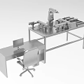 Advanced Industrial Equipment Setup with Robotic Arm Workbench Computer Monitor and Office Chair