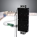 Black Audio Speaker Stack with Top Display Screen Connected Cables and Green Device for Stage