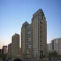 Modern Tall Office Building Featuring Glass Facade And Architectural Rooftop Design In Urban Setting