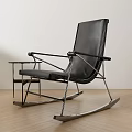 Modern Black Leather Leisure Rocking Chair With Metal Frame And Side Table On Wooden Floor