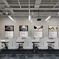 Modern Office Interior With White Chairs Long Table Wall Posters Hanging Lights And Green Plants