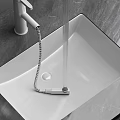 Modern Pull Out Hose Faucet With Water Flow In White Sink And Gray Background