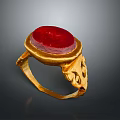 Elegant Fashionable Gold Ring With Red Gemstone And Intricate Decorative Design