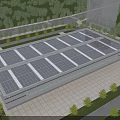 Modern Industrial Factory Building With Solar Panels On Roof And Green Surroundings