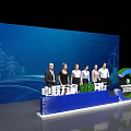 Group Photo Spot at International Energy Transition Forum With Power Towers Wind Turbines Stage Backdrop