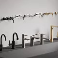 Various Stylish Faucet Designs Displayed On Wall And Countertop