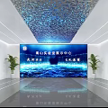 Modern Jidong Oilfield Exhibition Center Interior With Large Screen Green Plants And Energy Theme