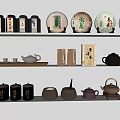 Traditional Tea Set Display On White Shelves With Tea Caddies Tea Cakes Teapots And Cups