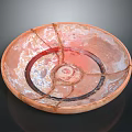 Handmade Ceramic Sculpture Circular Plate With Cracked Design And Orange Red Spiral Patterns