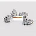 Four Gray Stones With Rough Surface Placed On White Background