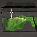 Scenic Green Mountainous Landscape With Winding Road And Wind Turbine In Transparent Cube