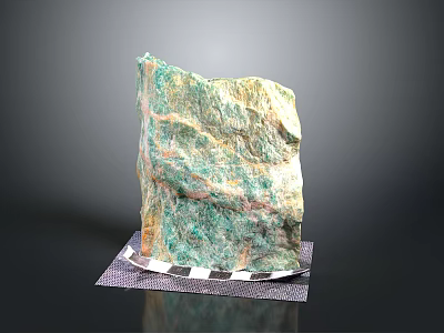 Large Natural Green and Yellow Textured Stone Decorative Piece on Checkered Mat with Dark Background 3d model