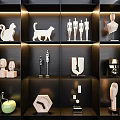 Modern Decorative Ornament Set Featuring Animal Figures Human Figurines Geometric Shapes On Black Display Shelves