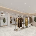 Stylish Clothing Store Interior With Mannequins Display Racks And Elegant Lighting