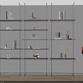 Modern Minimalist Interior Featuring Multi Tiered Shelving Unit With Books Decorative Vases And Sculptures