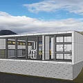 Modern Detached Villa With Concrete Exterior And Large Glass Windows On Grass Lawn