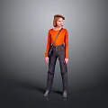 Stylish Woman Wearing Orange Top Gray Pants And Black Crossbody Bag Standing Against Gray Background