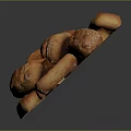 Stacked Pile of Golden Brown Crusty Bread Pieces on Dark Background